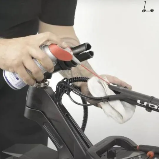 Man checking handlebar connection of segway ninebot scooter